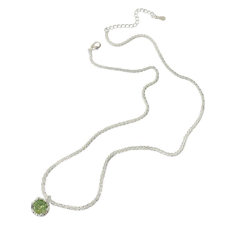 Cadena plata con dije de piedra verde esmeralda